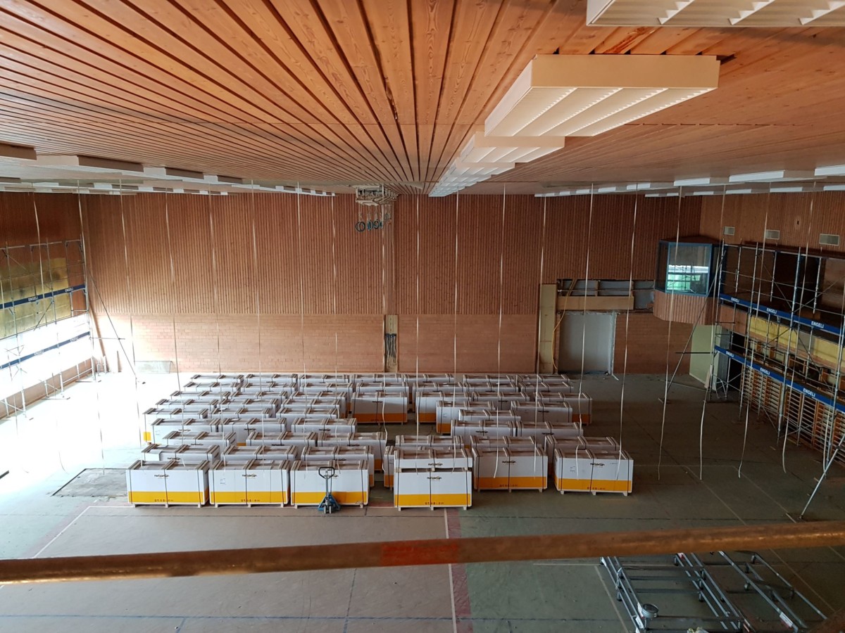 Sportanlage Tellenfeld Amriswil: Materiallager Verkleidungen in alter Halle l Krattiger Holzbau AG Amriswil