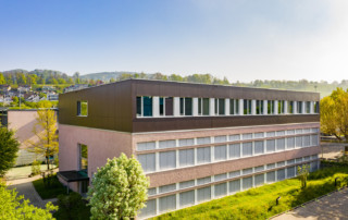 Schulhaus Allmend Meilen: Aufstockung mit Holzmodulen | Krattiger Holzbau AG Amriswil